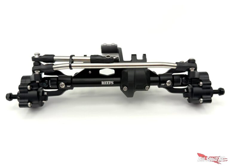 from our popular XP10! The REEFS XP199 Axle delivers up to an incredible 60° of steering angle for exceptional maneuverability. High-clearance C-hubs and a low-profile differential cover to maximize ground clearance, giving you the confidence to tackle demanding terrain. Built for strength from the inside out, the fully assembled axles feature precision-machined, hardened steel gears, spools, and shafts throughout. From the robust 6 mm portal stub shafts to every internal component, the XP199 Portal Axles are engineered to withstand today’s highest-torque applications while delivering the durability and performance serious builders expect. Housing: Black Anodized Machined Aluminum Gears: Machined, Hardened Steel Throughout Steering Angle: Up to 60∘ Axle Shafts: Machined, Hardened Steel, 5mm Pinned Universals: Machined, Hardened Steel C-Hubs: Machined Aluminum with 0∘, 10∘, and 20∘ Caster Adjustment Knuckles & Front Portal Covers: Machined Aluminum Servo Mount: BTA (Behind the Axle) with Skid Plate Spools: Machined, Hardened Steel, Keyed Portal Stub Shafts: 6mm with M5 Threads TECHNICAL SPECS: Ring and Pinion: 8T/30T Portal Gears: 18T/31T Hex to Hex width: 199mm. Servo on Axle mounting. Shims included for use between the Center driveshaft and housing